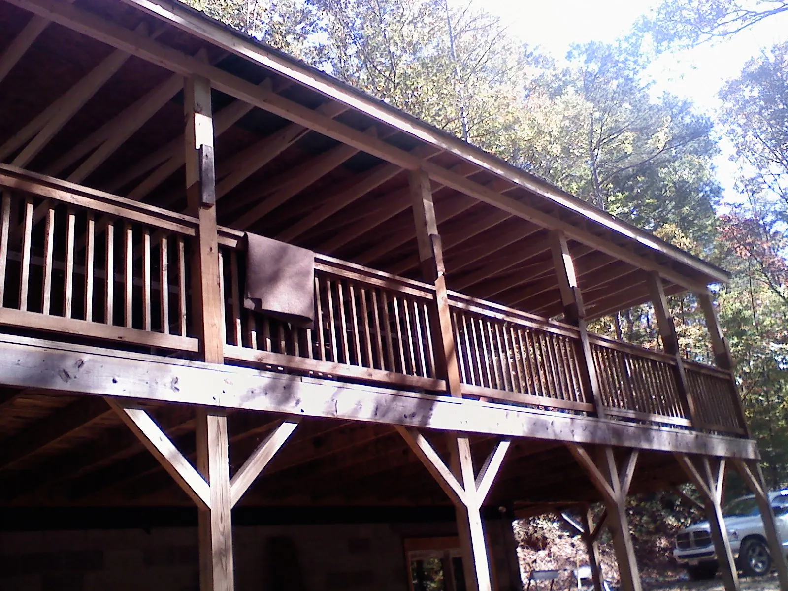 Timber framing under a new elevated porch and deck — Roof Leak Repair in D Lo by Roofing Brothers